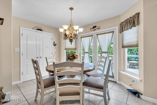 101 Taft Ct, Brick, NJ 08724 - dining space with a chandelier and light tile patterned floors