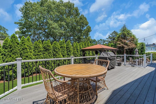 101 Taft Ct, Brick, NJ 08724 - wooden deck with a grill and outdoor dining space