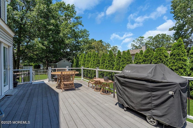 101 Taft Ct, Brick, NJ 08724 - wooden deck featuring outdoor dining space, area for grilling, and a storage unit