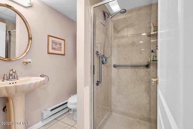 101 Taft Ct, Brick, NJ 08724 - full bathroom with baseboard heating, a stall shower, and tile patterned floors