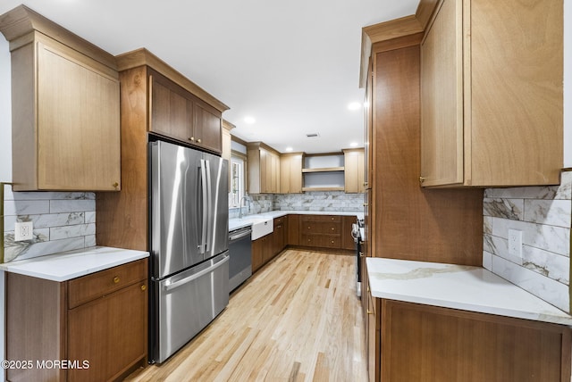 34 Traymore Rd, Freehold, NJ 07728 - kitchen featuring stainless steel appliances, open shelves, backsplash, light wood-style floors, and light countertops