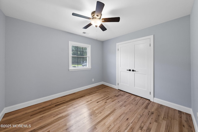 34 Traymore Rd, Freehold, NJ 07728 - unfurnished bedroom featuring light wood finished floors and ceiling fan
