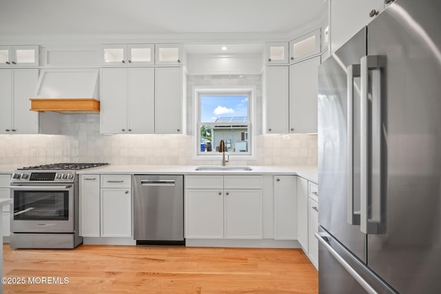 569 Ocean Blvd, Leonardo, NJ 07737 - kitchen with stainless steel appliances, premium range hood, and white cabinets