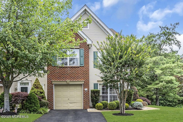 106 Tarpon Dr, Sea Girt, NJ 08750 - view of front of property featuring driveway, an attached garage, a front yard, and brick siding