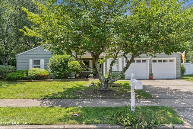 7 Plymouth Dr, Howell, NJ 07731 - obstructed view of property featuring driveway and a front lawn
