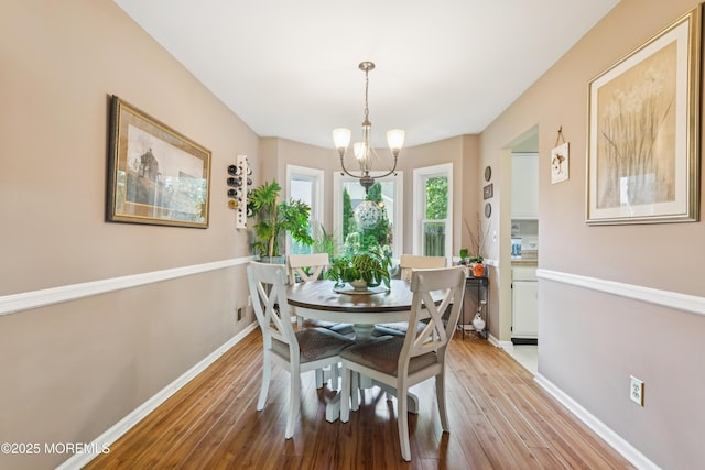 7 Plymouth Dr, Howell, NJ 07731 - dining area featuring light wood-style flooring and a chandelier
