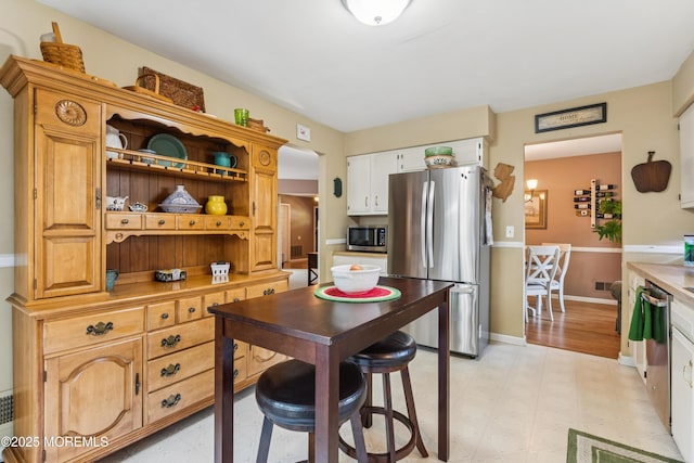 7 Plymouth Dr, Howell, NJ 07731 - kitchen with stainless steel appliances, light countertops, light floors, and open shelves