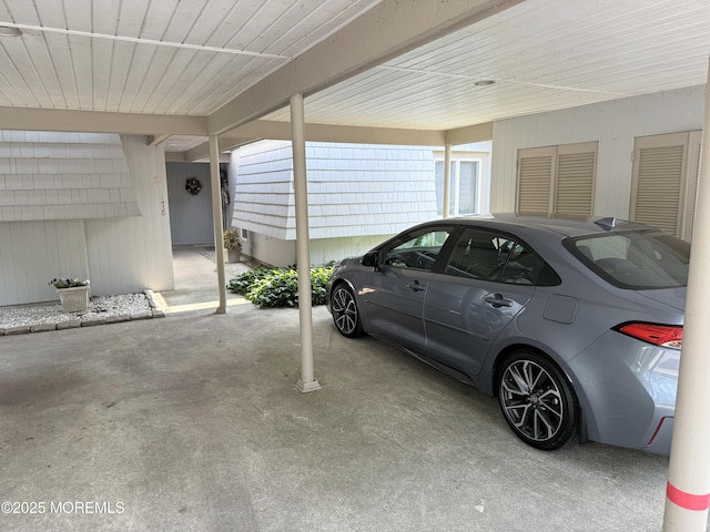 170 E Holly Ln Unit 105, Little Egg Harbor, NJ 08087 - view of car parking featuring a carport