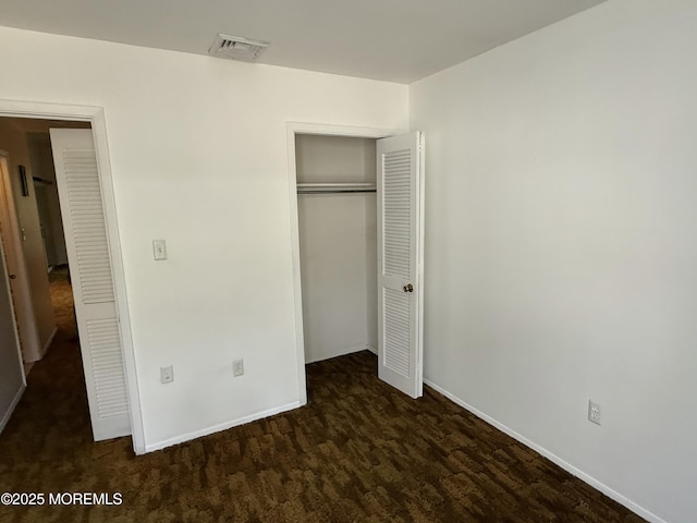 170 E Holly Ln Unit 105, Little Egg Harbor, NJ 08087 - unfurnished bedroom with carpet floors and a closet