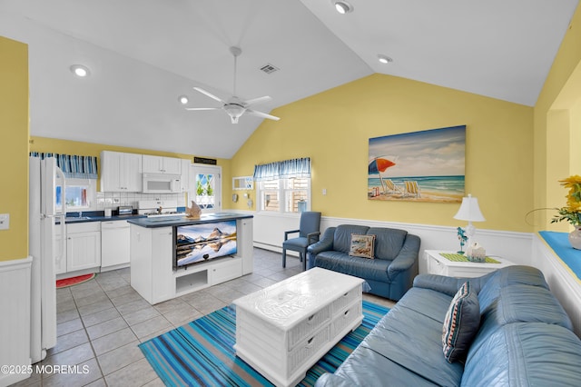 19 Elizabeth Ave, Lavallette, NJ 08735 - living room featuring wainscoting, vaulted ceiling, light tile patterned floors, ceiling fan, and recessed lighting