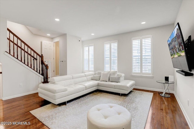 108 Warbler Way, Freehold, NJ 07728 - living area with plenty of natural light, wood finished floors, recessed lighting, and stairway