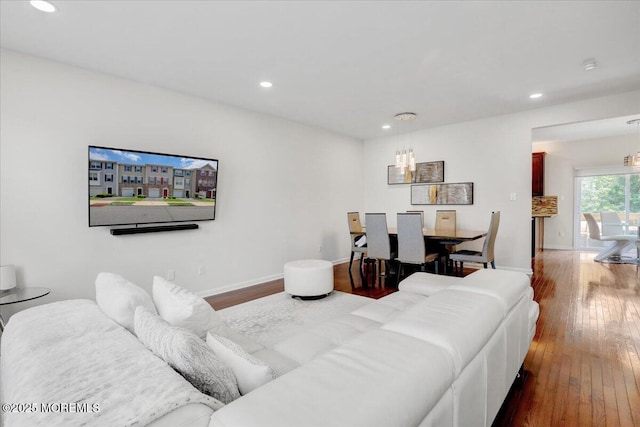 108 Warbler Way, Freehold, NJ 07728 - living area with wood-type flooring, recessed lighting, and a chandelier