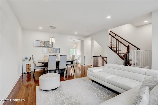 108 Warbler Way, Freehold, NJ 07728 - living room featuring wood finished floors, stairway, recessed lighting, and a chandelier