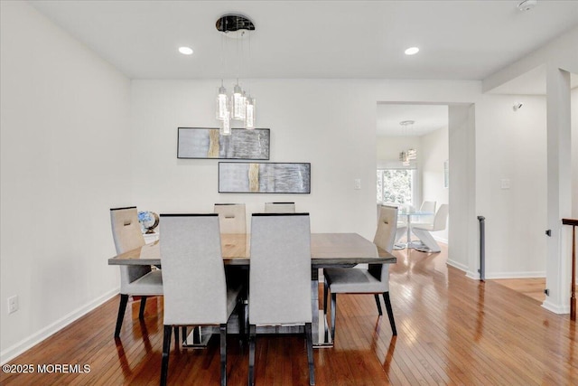 108 Warbler Way, Freehold, NJ 07728 - dining space with dark wood-style flooring, a chandelier, and recessed lighting