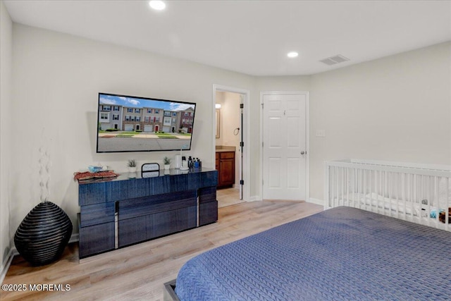108 Warbler Way, Freehold, NJ 07728 - bedroom with wood finished floors, recessed lighting, and ensuite bath