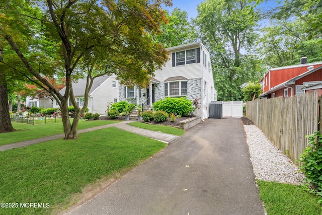 15 Park Blvd, Ocean Twp, NJ 07712 - view of front facade with driveway and a gate