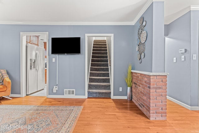 15 Park Blvd, Ocean Twp, NJ 07712 - living room with light wood finished floors, ornamental molding, and stairway