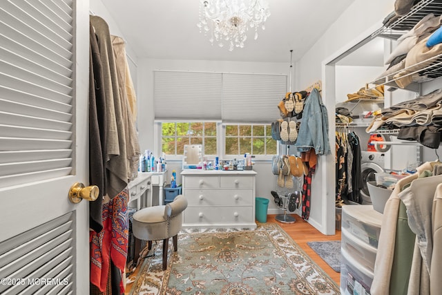 15 Park Blvd, Ocean Twp, NJ 07712 - walk in closet featuring a chandelier and wood finished floors