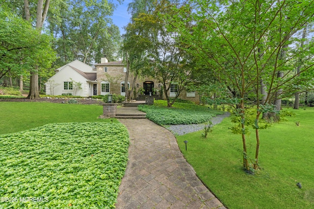 79 Cypress Neck Rd, Lincroft, NJ 07738 - view of front of home featuring a chimney and a front lawn