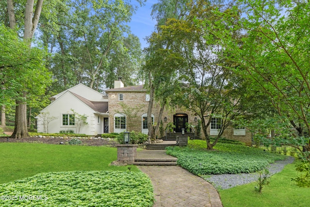 79 Cypress Neck Rd, Lincroft, NJ 07738 - view of front facade featuring a front lawn and a chimney