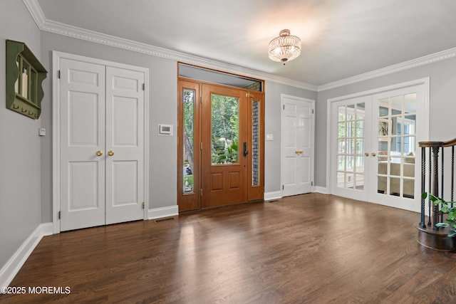 79 Cypress Neck Rd, Lincroft, NJ 07738 - entryway featuring french doors, wood finished floors, and ornamental molding