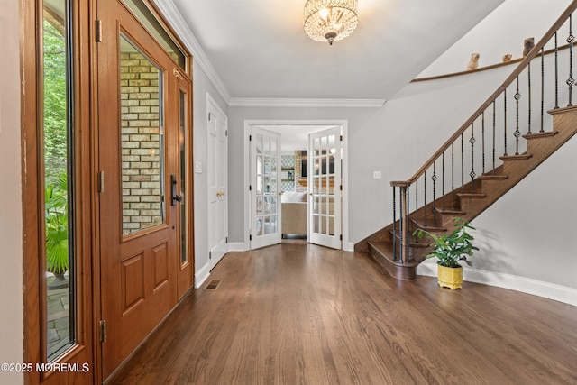 79 Cypress Neck Rd, Lincroft, NJ 07738 - foyer with stairway, healthy amount of natural light, wood finished floors, and crown molding