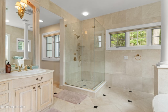 79 Cypress Neck Rd, Lincroft, NJ 07738 - bathroom with ornate columns, a shower stall, tile patterned flooring, and vanity