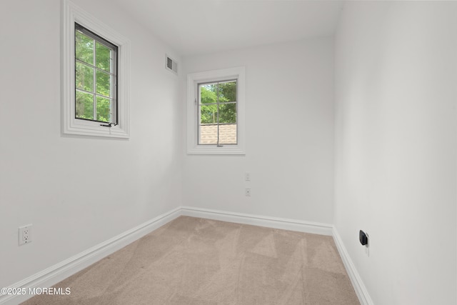 79 Cypress Neck Rd, Lincroft, NJ 07738 - carpeted empty room with plenty of natural light