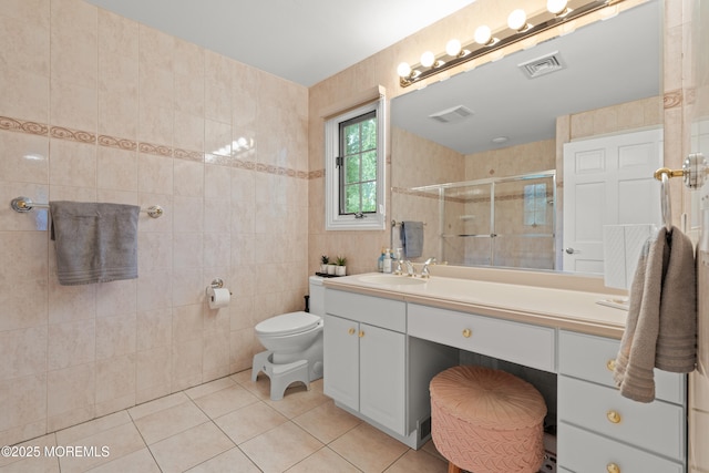 79 Cypress Neck Rd, Lincroft, NJ 07738 - full bath featuring tile patterned flooring, vanity, a stall shower, and tile walls