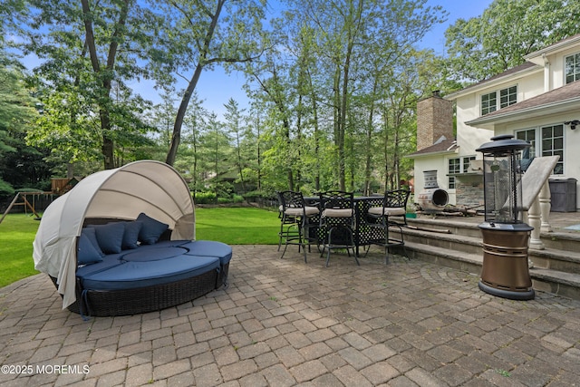 79 Cypress Neck Rd, Lincroft, NJ 07738 - view of patio / terrace featuring outdoor dining area, a playground, and view of wooded area