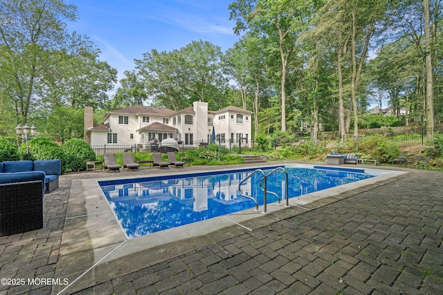 79 Cypress Neck Rd, Lincroft, NJ 07738 - view of swimming pool featuring a patio area and view of scattered trees