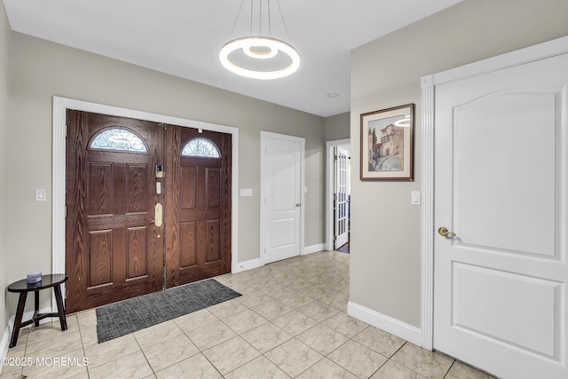 100 Case Rd, Lakewood, NJ 08701 - entryway featuring a chandelier and light tile patterned flooring