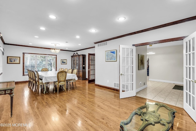 100 Case Rd, Lakewood, NJ 08701 - dining space with french doors, crown molding, recessed lighting, a chandelier, and wood finished floors