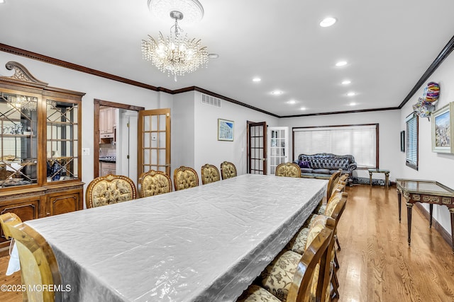 100 Case Rd, Lakewood, NJ 08701 - dining room with wood finished floors, a chandelier, recessed lighting, and ornamental molding