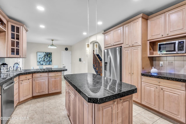 100 Case Rd, Lakewood, NJ 08701 - kitchen with stainless steel appliances, light brown cabinets, recessed lighting, tasteful backsplash, and glass insert cabinets