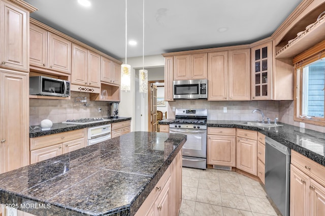 100 Case Rd, Lakewood, NJ 08701 - kitchen with stainless steel appliances, glass insert cabinets, decorative backsplash, dark countertops, and light brown cabinets