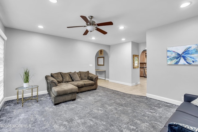 100 Case Rd, Lakewood, NJ 08701 - living room featuring arched walkways, recessed lighting, a ceiling fan, light carpet, and light tile patterned flooring
