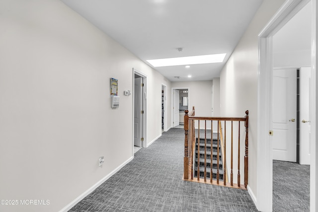 100 Case Rd, Lakewood, NJ 08701 - hall featuring carpet floors, a skylight, and an upstairs landing