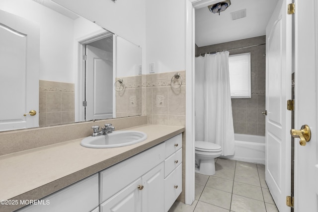 100 Case Rd, Lakewood, NJ 08701 - full bath featuring vanity, shower / bath combo with shower curtain, tile patterned floors, and tile walls
