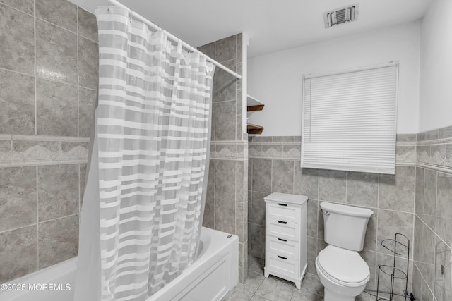 100 Case Rd, Lakewood, NJ 08701 - bathroom with shower / bathtub combination with curtain, tile walls, tile patterned floors, and a wainscoted wall