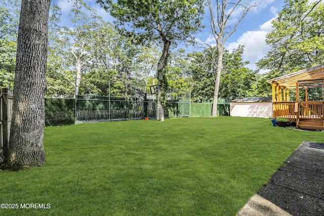 100 Case Rd, Lakewood, NJ 08701 - fenced backyard with a shed and a wooden deck