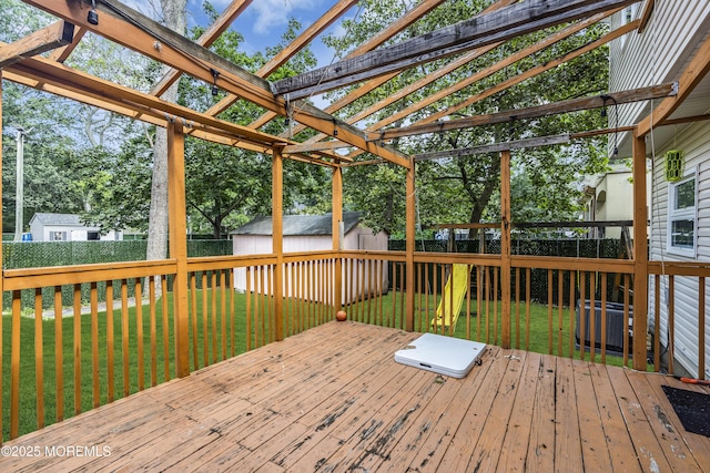 100 Case Rd, Lakewood, NJ 08701 - wooden deck with a storage shed and a fenced backyard