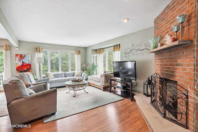 56 Violet Ct, Toms River, NJ 08753 - living area with wood finished floors and a fireplace