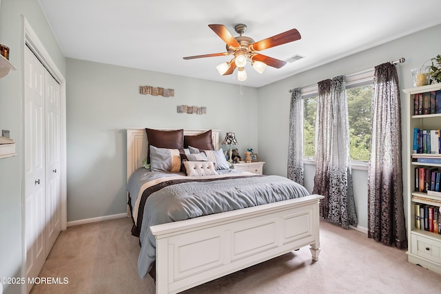 56 Violet Ct, Toms River, NJ 08753 - bedroom with light carpet, a closet, and a ceiling fan