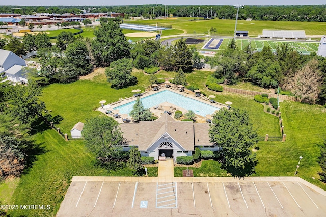 56 Violet Ct, Toms River, NJ 08753 - aerial view of a pool area and a tree filled landscape