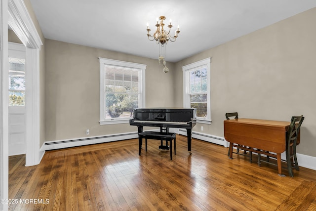 28 Broadway Rd, Freehold, NJ 07728 - living area featuring baseboard heating, a chandelier, and wood-type flooring