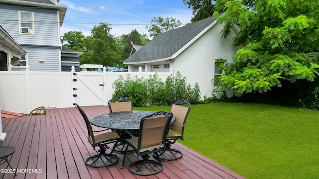 28 Broadway Rd, Freehold, NJ 07728 - wooden deck featuring a gate, a fenced backyard, and outdoor dining area