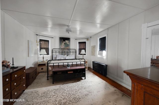 396 2nd Ave, Long Branch, NJ 07740 - bedroom with wood finished floors and radiator
