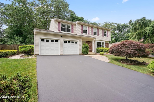 11 Hazelwood Ct, Howell, NJ 07731 - view of front of house featuring asphalt driveway