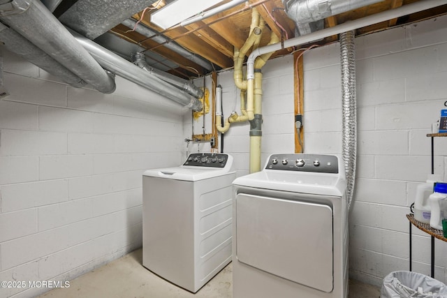 11 Hazelwood Ct, Howell, NJ 07731 - washroom featuring washing machine and clothes dryer and concrete block wall